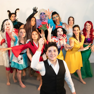11 dancers dressed as different Disney princesses and villains, with a dance dressed as a "bachelor" in front of them