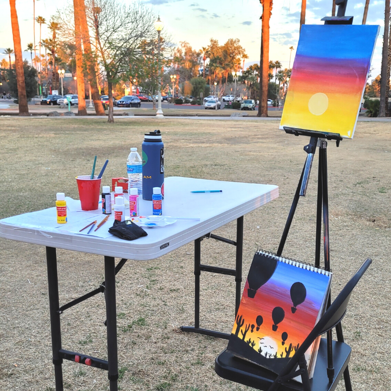 Sunset paintings on mini canvases in the park
