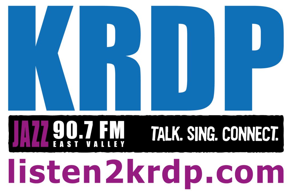 Logo with text KRDP Jazz 90.7 FM East Valley talk. Sing. Connect. listen2krdp.com