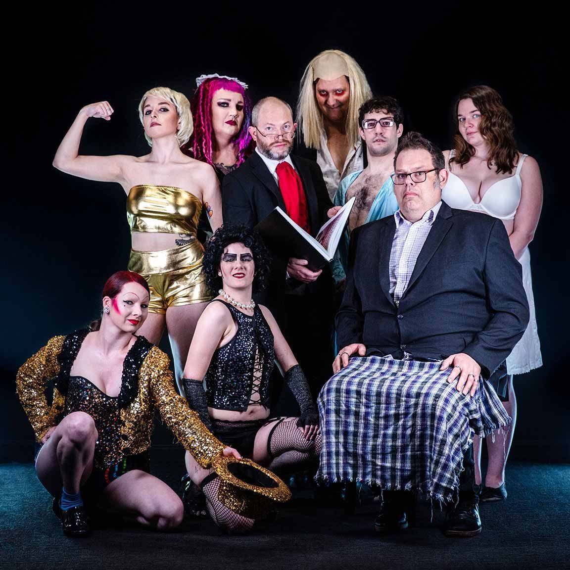 Cast photograph of all the different actors playing characters that are in Rocky Horror Picture Show